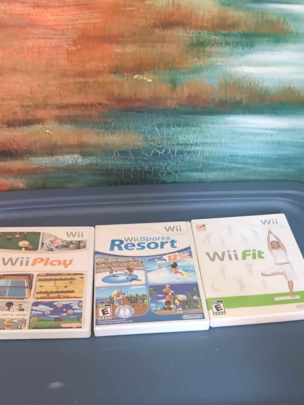 Nintendo Wii Game Trio — White Cases with Multicolor Covers